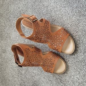 Leather Lazer cut medallion block heeled sandals